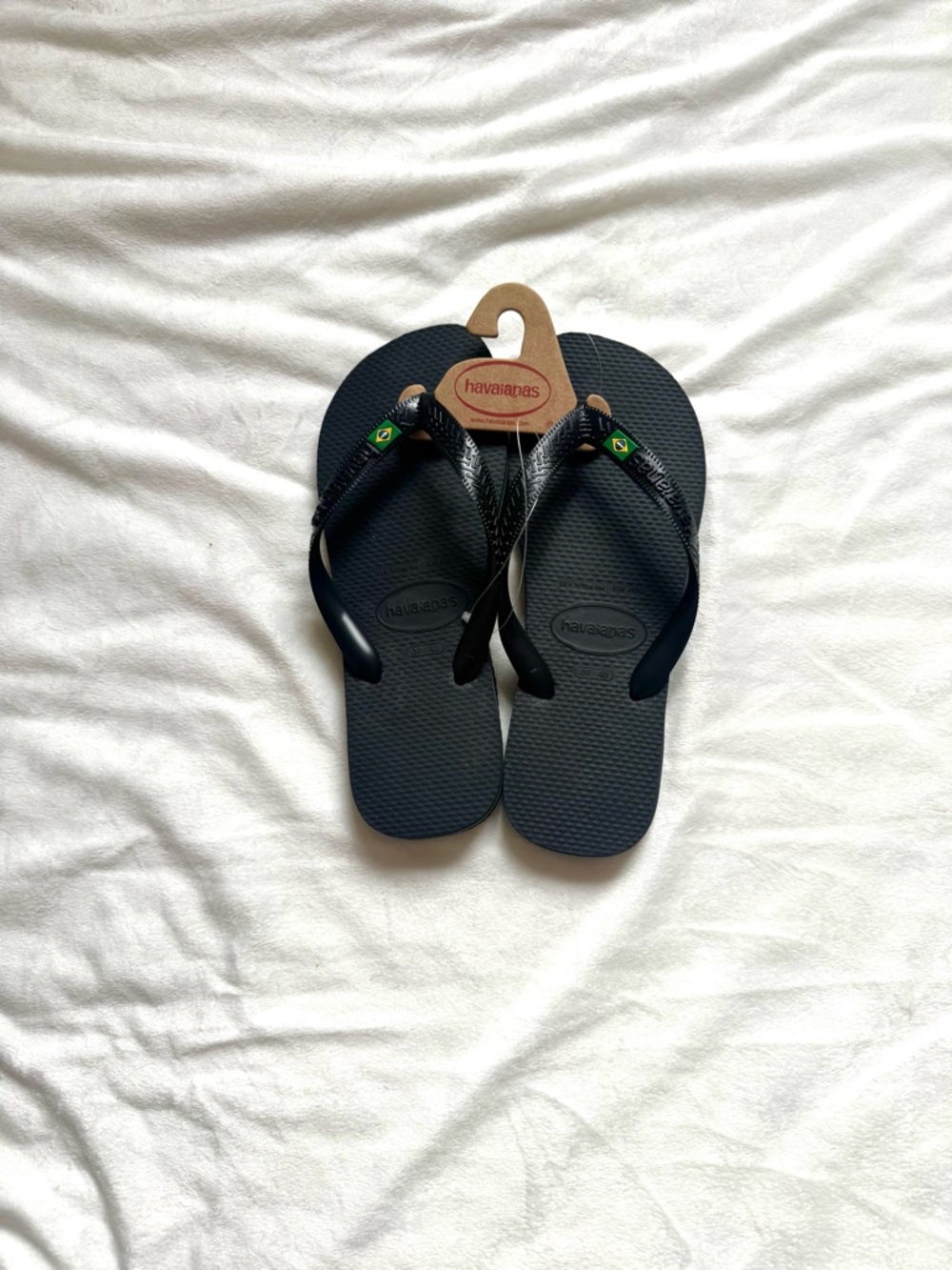 Havaianas Black Flip Flops with Brazilian Flag Accent